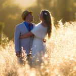 Bride and Groom in a sun drenched meadow of golden grasses at Bell Valley Retreat — Anderson Valley, Mendocino County, California