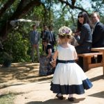 the flower girl proceeds down the dirt path at Bell Valley Retreat — Anderson Valley, Mendocino County, California