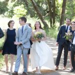 A wedding party walking up the dirt road at Bell Valley Retreat — Anderson Valley, Mendocino County, California