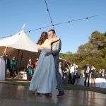 Bell Valley Retreat Wedding with Couple Dancing and wedding tent in background — Anderson Valley, Mendocino County, California