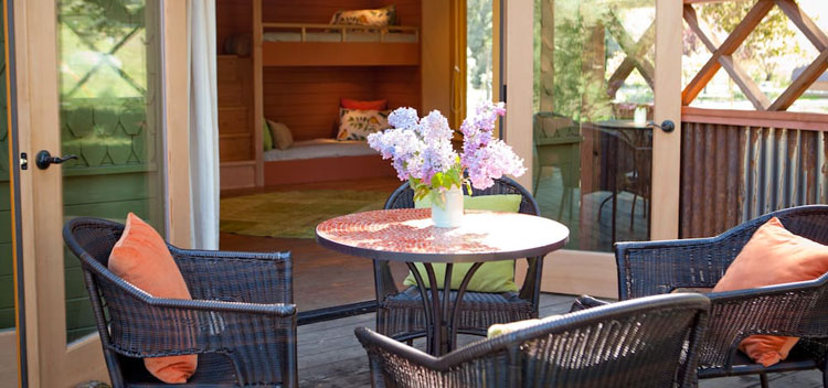 outdoor seating on the patio of the Bunkhouse at The Toll House at Bell Valley Retreat in Anderson Valley, Mendocino County, California