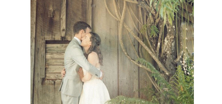 a couple embrace at The Toll House at Bell Valley Retreat in Anderson Valley, Mendocino County, California