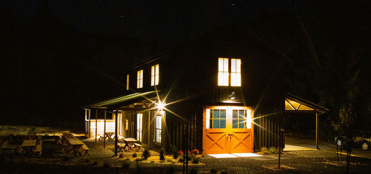 the barn illuminated at night